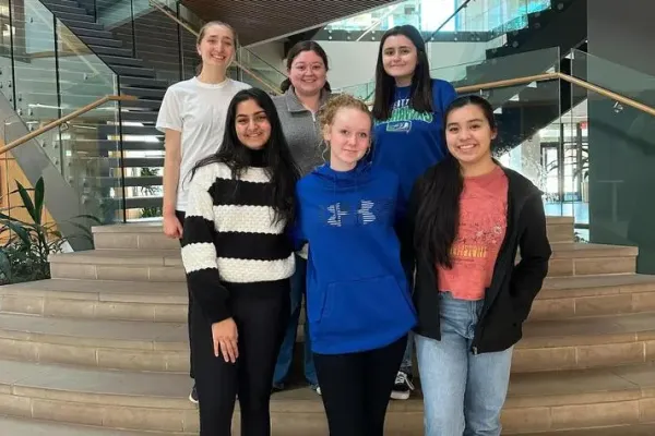 Six high school students with I Can End the Trend posing on steps