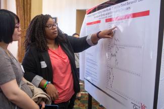 student talking about research