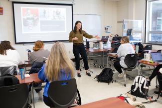 Professor teaching in EDSCE classroom