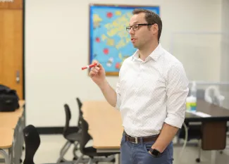 Dr. Cormier teaching in the classroom