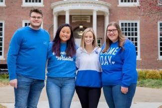 Student ambassadors in front of Taylor Education Building.