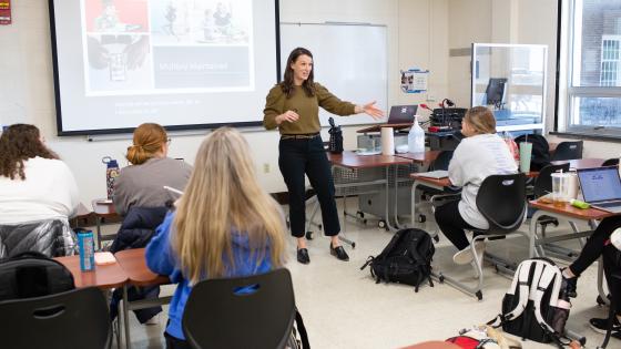 Professor teaching in EDSCE classroom